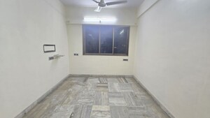 Living Room in 1 BHK Apartment at Shree Shivdham CHS, Malad West – for Rent