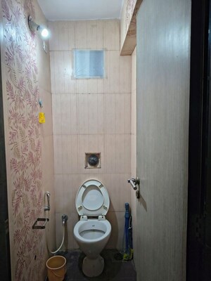 Bathroom in 2 BHK Apartment at Soham Garden, Manpada – for Rent