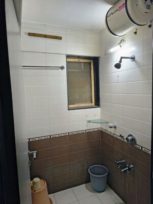 Bathroom in 2 BHK Apartment at Soham Garden, Manpada – for Rent