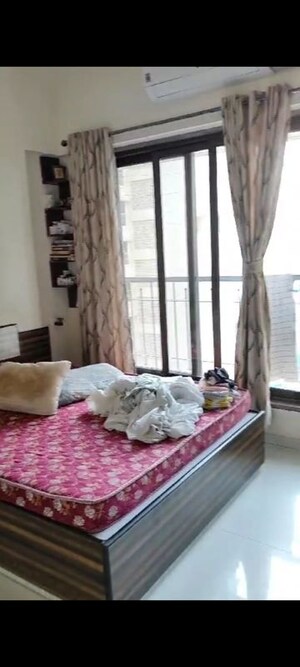 Bedroom in 2 BHK Apartment at Abrol Avirahi Heights, Malad West – for Rent