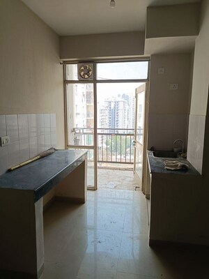 Kitchen in 1 BHK Apartment at Adani Aangan, Sector 89a – for Sale