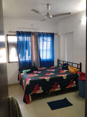 Bedroom in 2 BHK Apartment at Nav Jyotirling CHS, Malad East – for Rent