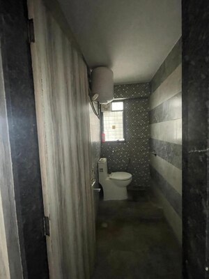 Bathroom in 1 BHK Apartment at Tirupati Regalia Phase 2, Vishrantwadi – for Rent
