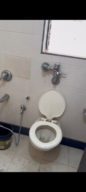 Bathroom in 3 BHK Apartment at Starwing Katyayni Residency, Andheri East – for Rent