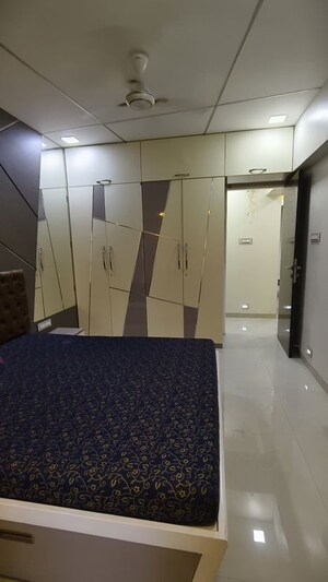 Master Bedroom in 2 BHK Apartment at Satellite Royale, Goregaon East – for Rent