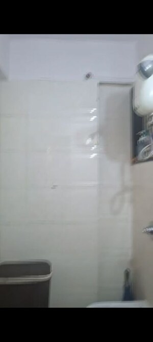 Bathroom in 2 BHK Apartment at Tilak Nagar – for Rent