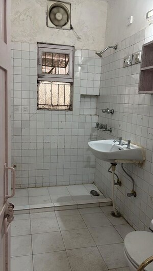 Bathroom in 3 BHK Apartment at Alaknanda – for Rent