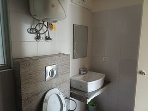 Bathroom in 4 BHK Builder Floor at Orchid Island, Sector 51 – for Rent