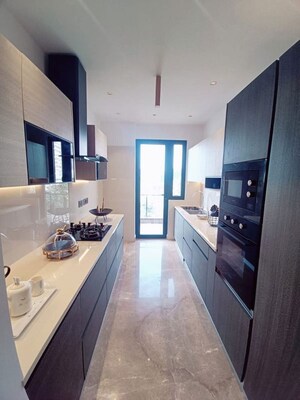 Kitchen in Studio Apartment at DLF Oakwood Estate, Dlf Phase ii – for Rent