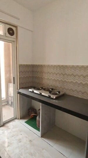 Kitchen in 2 BHK Apartment at Lodha Upper Thane Meadows, Anjur – for Sale