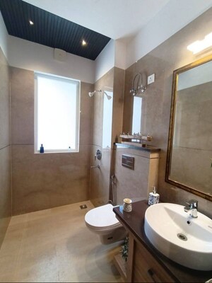 Bathroom in 4 BHK Apartment at Ambience Creacions, Sector 22 – for Rent