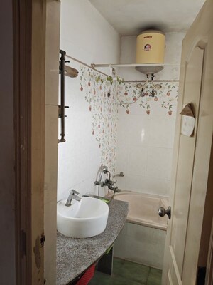 Bathroom in 4 BHK Apartment at Golden Paradise, Old Airport Road – for Rent