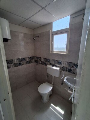 Bathroom in 2 BHK Apartment at Signature Global Proxima, Sector 89 – for Rent