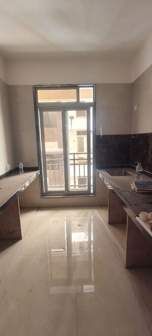 Kitchen in 3 BHK Apartment at Neel Tarang CHS, Nerul Sector 21 – for Sale