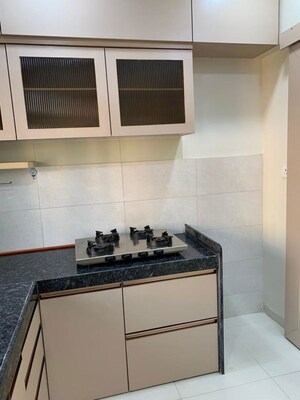 Kitchen in 3 BHK Apartment at Rustomjee Azziano Wing D, Thane West – for Sale