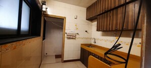 Kitchen in 2 BHK Apartment at Oshiwara Mhada, Andheri West – for Rent