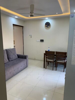 Living Room in 1 BHK Apartment at Lodha Amara, Kolshet Road – for Rent