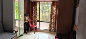 Living Room in 1 BHK Apartment at Safal Park, Nerul – for Sale