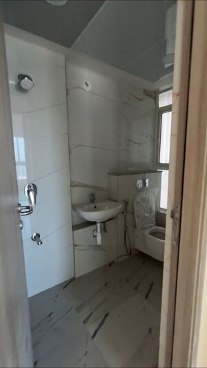 Bathroom in 1 BHK Apartment at Gundecha Sunflower, Kandivali East – for Rent