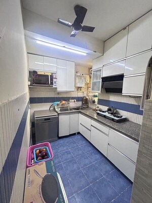 Kitchen in 3 BHK Apartment at Unitech Woodstock Floors, Sector 50 – for Rent