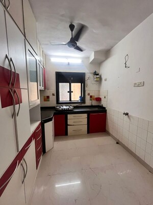 Kitchen in 1 BHK Apartment at Seven Bunglow – for Rent