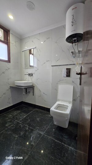 Bathroom in 2 BHK Apartment at Chattarpur – for Rent