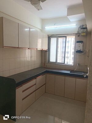 Kitchen in 2 BHK Apartment at Rekha CHS Wadala, Wadala – for Rent