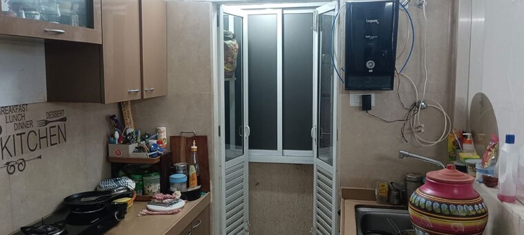 Kitchen, dosti-oak 2 Bedroom 640 Sq.Ft. Apartment In Kolshet Industrial Area Thane 10138382