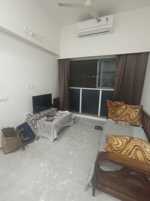 Living Room in 1 BHK Apartment at LnT Veridian, Powai – for Rent