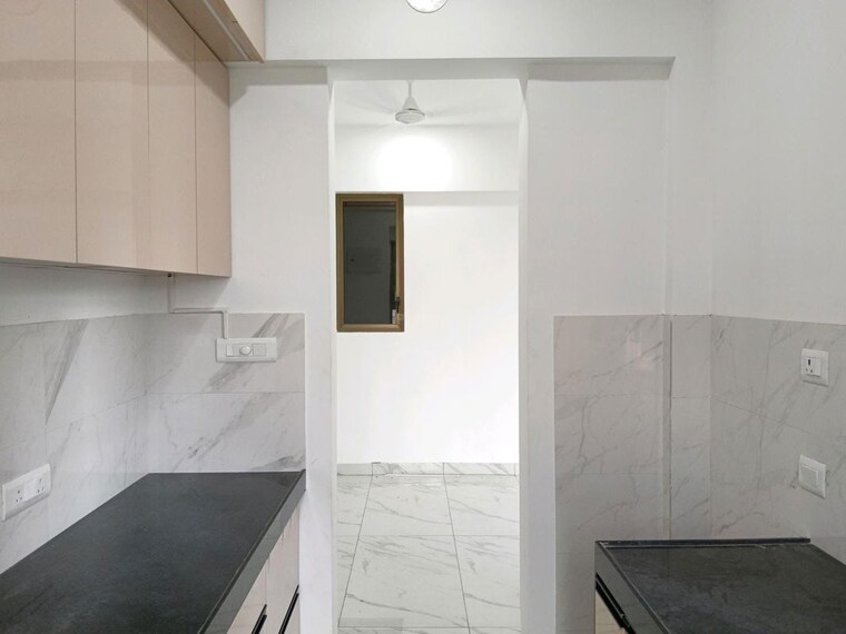 Kitchen, raymond-ten-x-habitat 2 Bedroom 798 Sq.Ft. Apartment In Pokhran Road No Two Thane 10130143