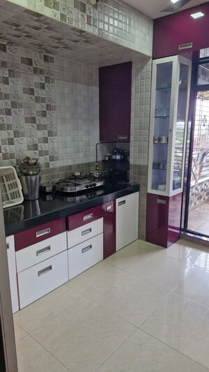 Kitchen in 1 BHK Apartment at Raunak Bliss, Ghodbunder Road – for Sale