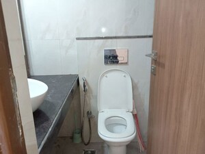 Bathroom in 2 BHK Apartment at Courtyard by Narang Realty and The Wadhwa Group, Pokhran Road No Two – for Sale
