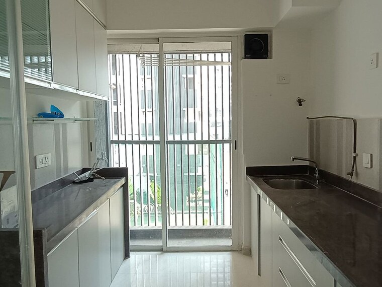 Kitchen, courtyard-by-narang-realty-and-the-wadhwa-group 2 Bedroom 934 Sq.Ft. Apartment In Pokhran Road No Two Thane 10117160