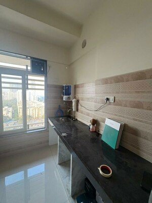 Kitchen in 1.5 BHK Apartment at Sheth Avante, Kanjurmarg West – for Rent