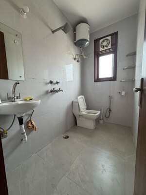 Bathroom in 1 BHK Apartment at Palm Residency Chhatarpur, Chattarpur – for Rent