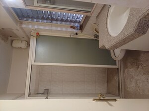 Kitchen in 2 BHK Apartment at Raheja Classique, Andheri West – for Sale