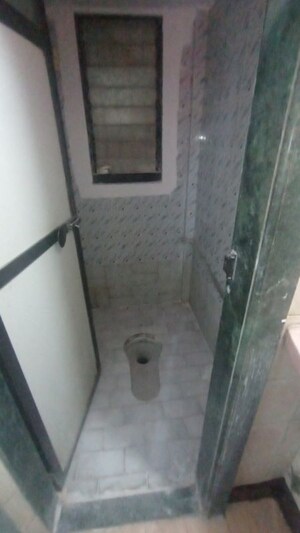 Bathroom in 2 BHK Apartment at Deepal CHS, Dombivli West – for Rent