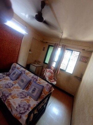 Living Room in 2 BHK Apartment at Deepal CHS, Dombivli West – for Rent