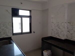 Kitchen in 2 BHK Apartment at Akash Kiran Apartment, Vile Parle East – for Sale