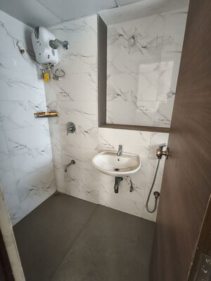 Bathroom in 3 BHK Apartment at Lodha Lakeshore Greens, Dombivli East – for Rent