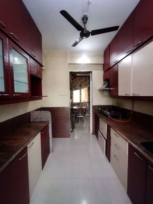 Kitchen in 3 BHK Apartment at Millennium Avanish Phase I, Sector 10a Airoli – for Rent