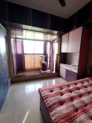 Bedroom in 3 BHK Apartment at Millennium Avanish Phase I, Sector 10a Airoli – for Rent