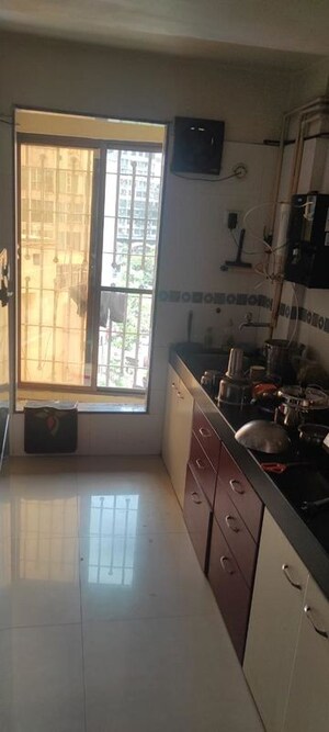 Kitchen in 2 BHK Apartment at Kotharis Vinay Hermitage, Mira Road – for Rent