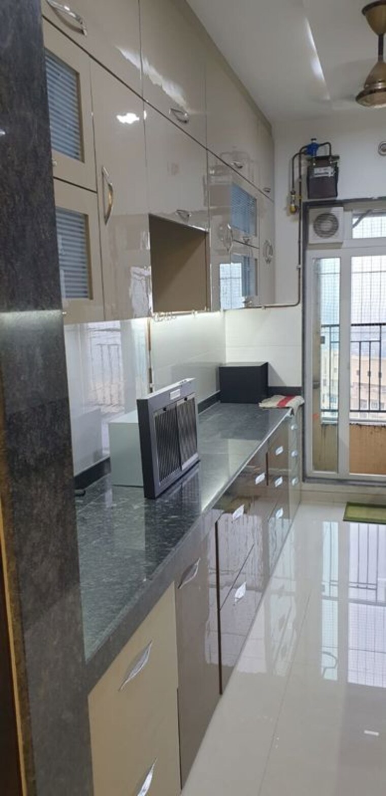 Kitchen, rustomjee-azziano-wing-i 3 Bedroom 1180 Sq.Ft. Apartment In Thane West Thane 10140414