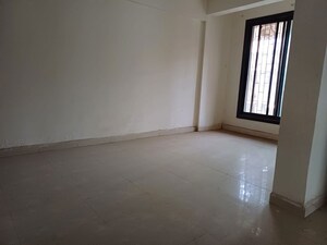 Room in 2.5 BHK Apartment at Gokulvan CHS, Kamothe Sector 34 – for Sale