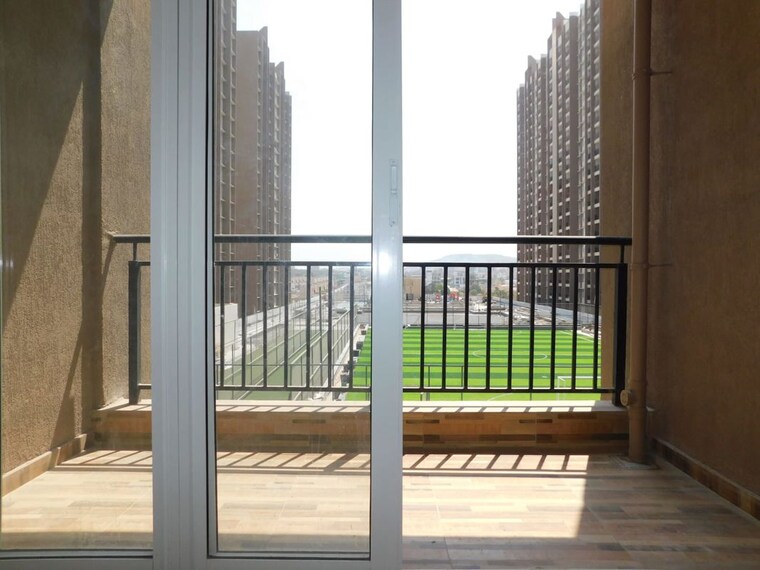 Balcony, kolte-patil-life-republic-16th-avenue-arezo 2 Bedroom 710 Sq.Ft. Apartment In Hinjewadi Pune 10142956