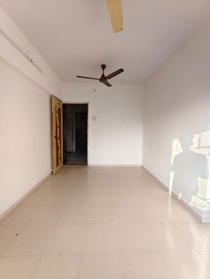 Living Room in 1 BHK Apartment at Shree Prastha CHS, Owale – for Rent