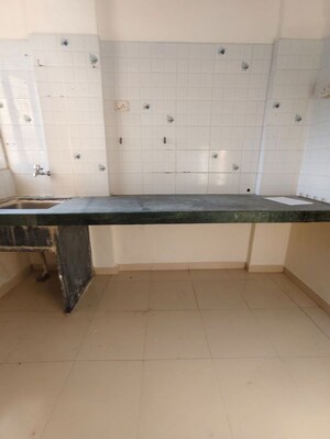 Kitchen in 1 BHK Apartment at Shree Prastha CHS, Owale – for Rent