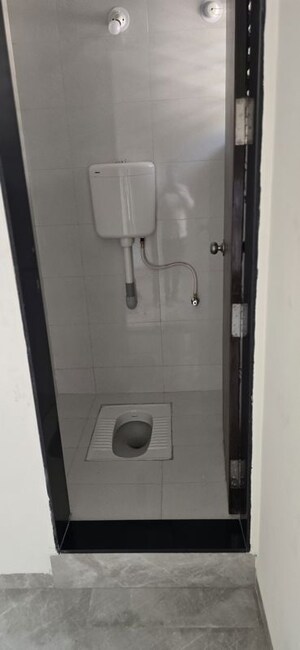 Bathroom in 4 BHK Apartment at Arya Heights Pimple, Pimple Gurav – for Rent