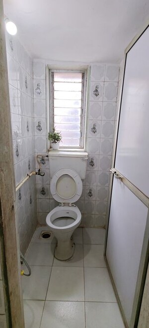 Bathroom in 1 BHK Apartment at United Unity Heights, Malad West – for Rent
